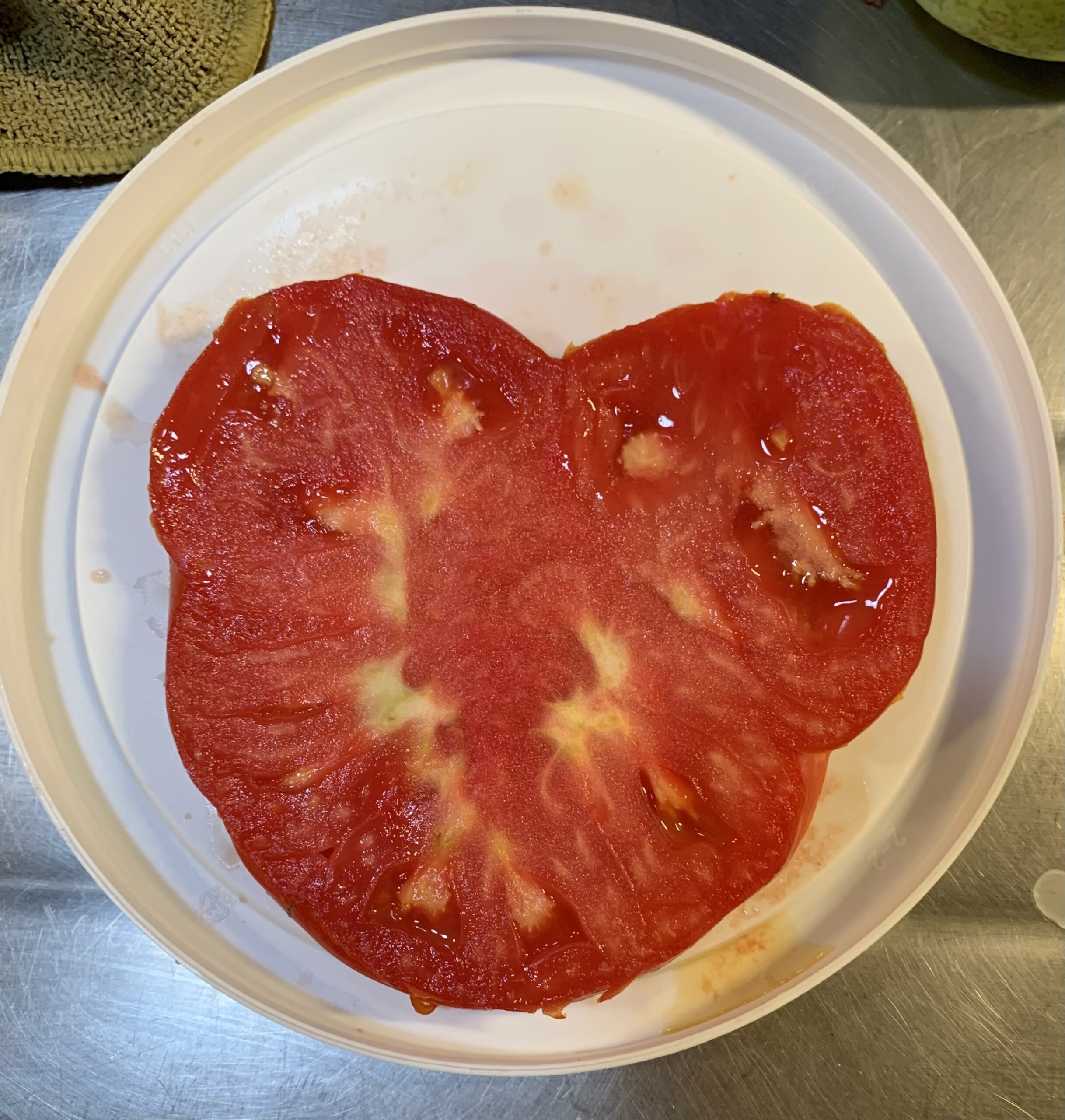 Yummy heart-shaped Beefsteak tomato from the garden