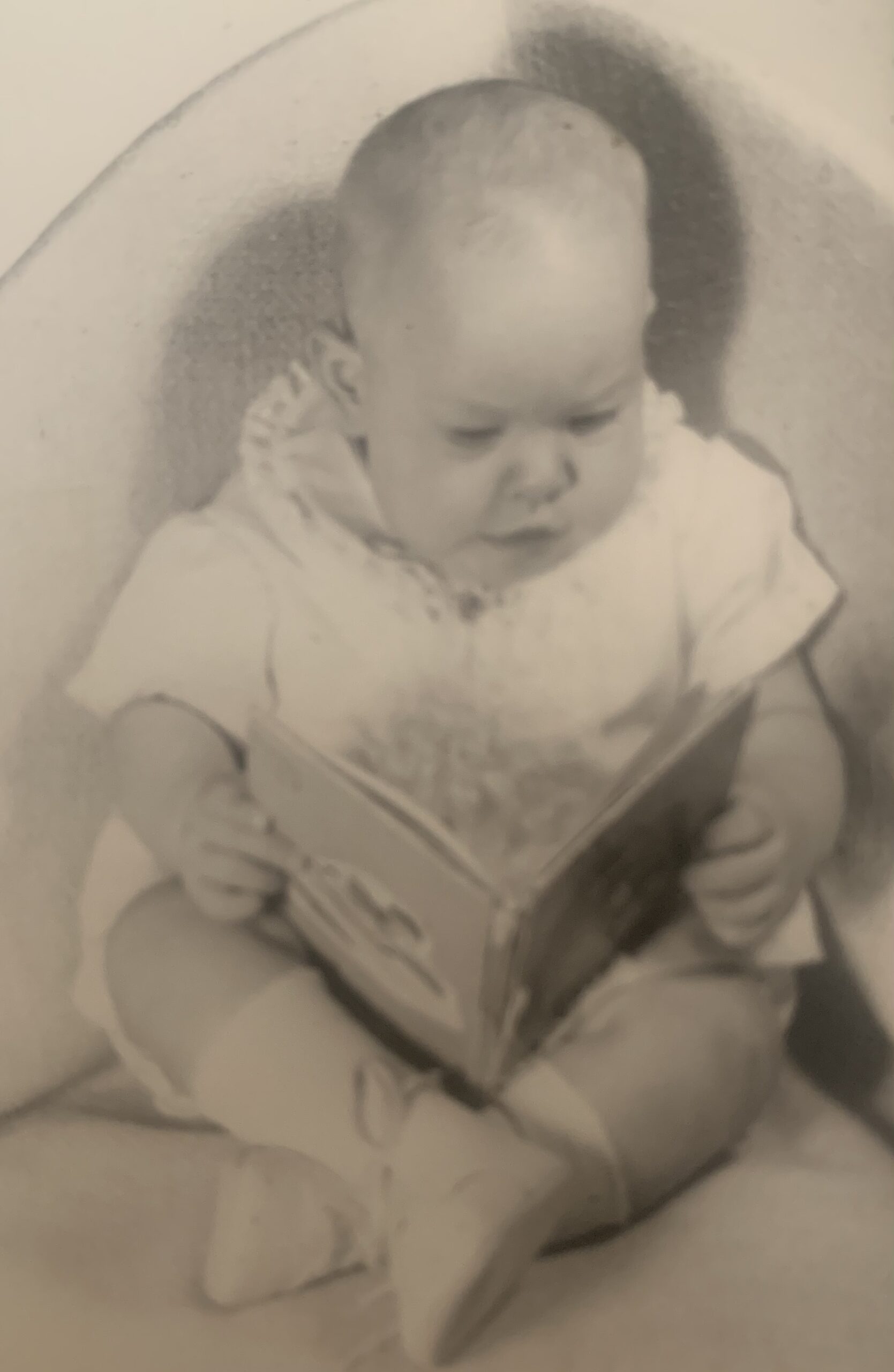 3 1/2 months old - I always have loved reading!